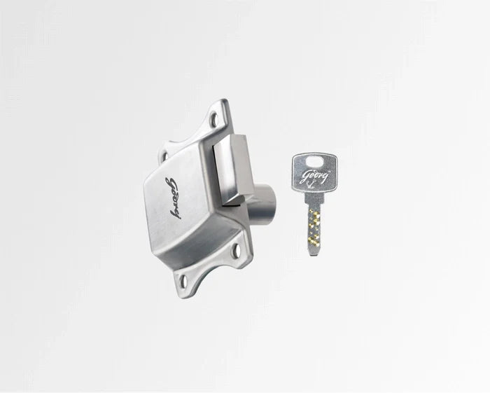 Metallic ignition switch and key on a light gray background