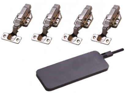 Four metallic cabinet hinges and a black electronic device on a white background