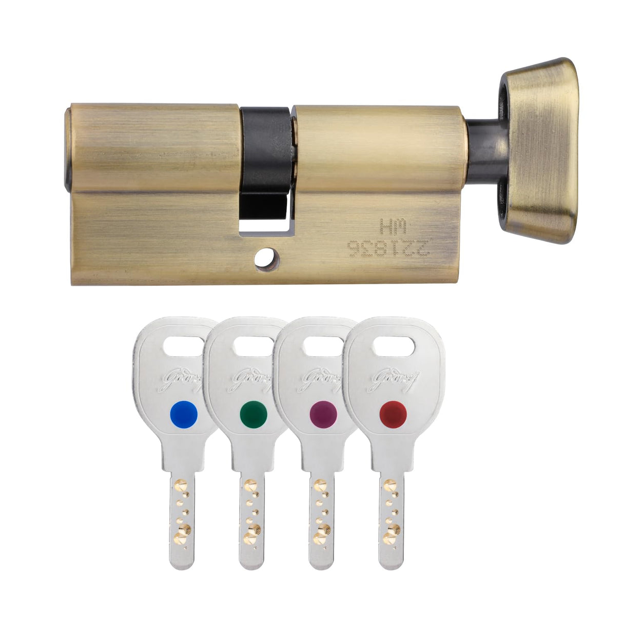 Brass door lock cylinder with four keys on a white background
