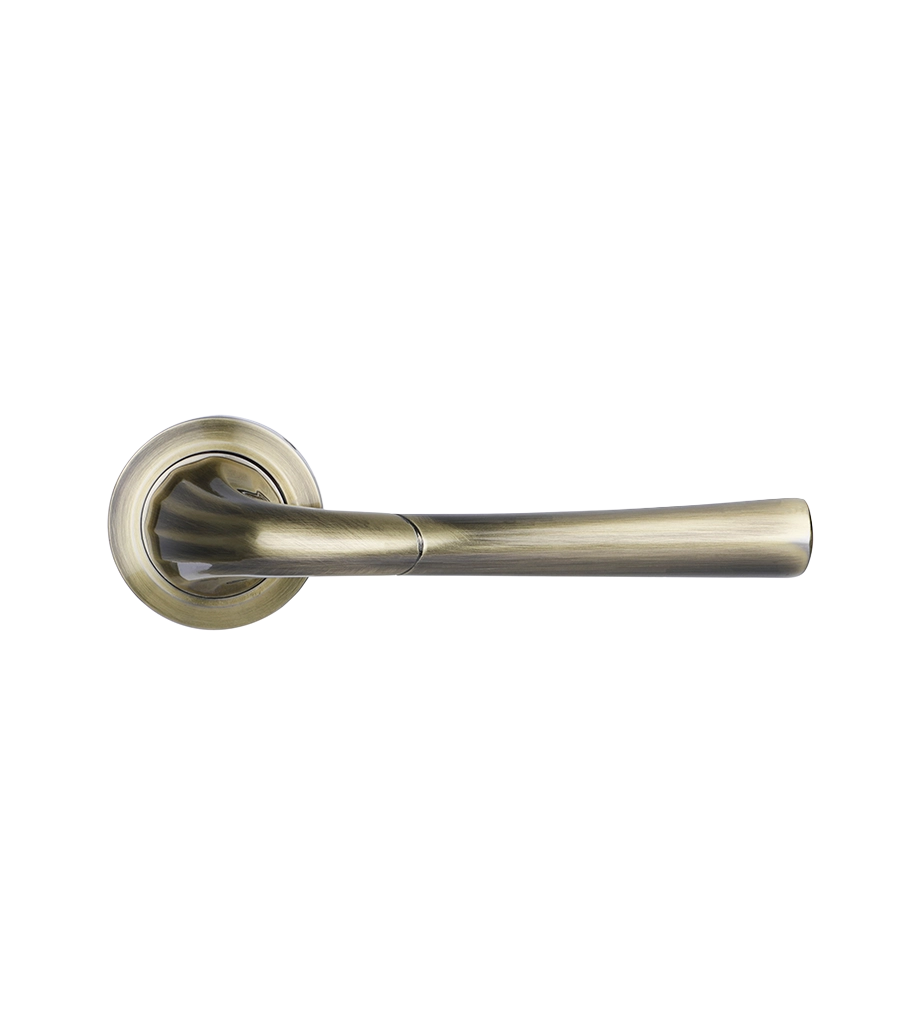 Bronze door handle on a white background