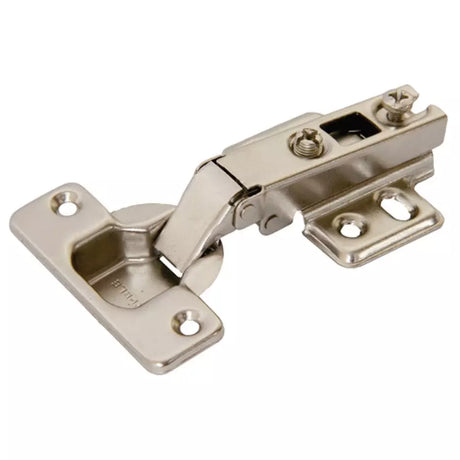Pair of metallic cabinet hinges on a white background