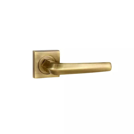 Gold door handle on a white background