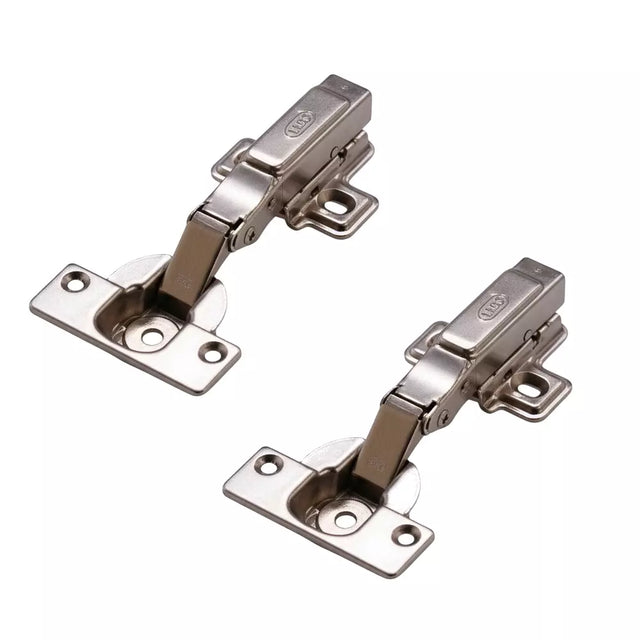 Pair of metallic cabinet hinges on a white background