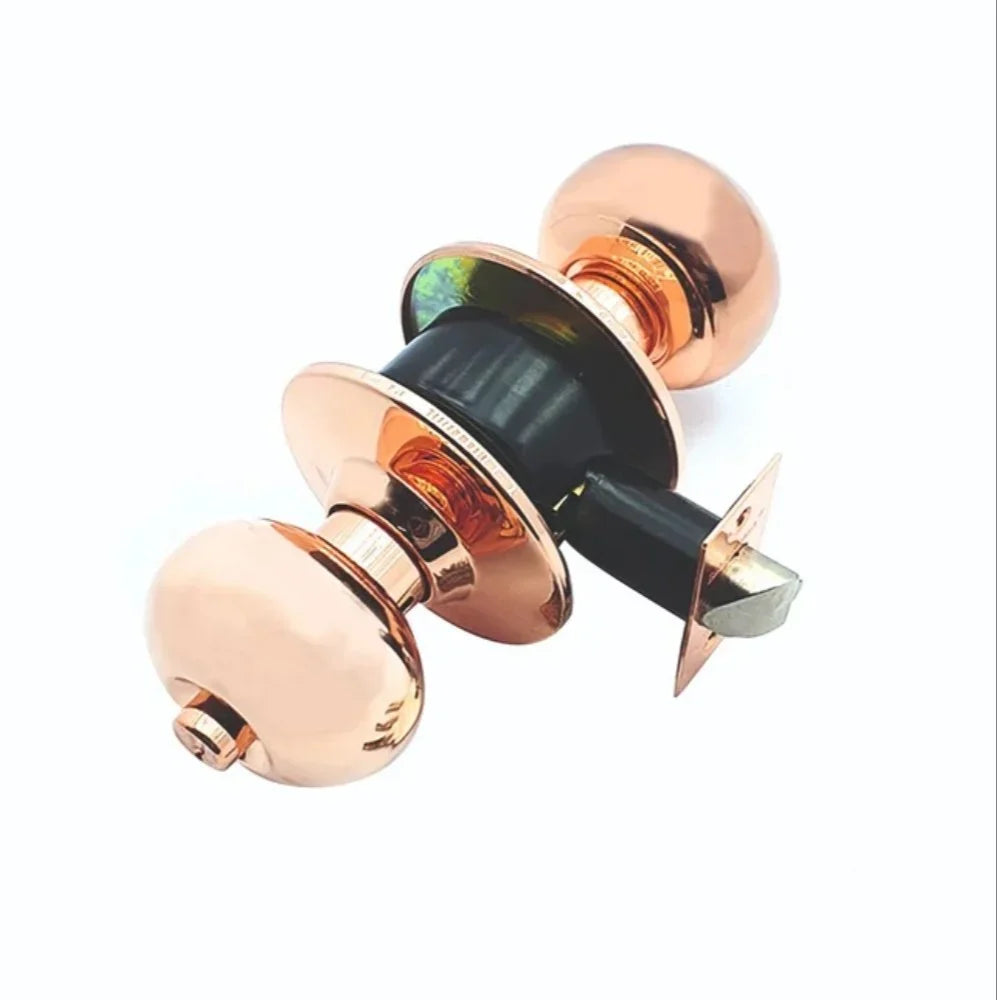 Rose gold door handle on a white background