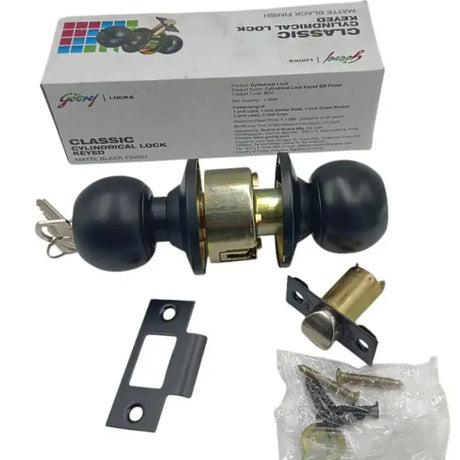 Door lock set with keys and installation hardware on a white background, featuring Godrej Locks packaging.