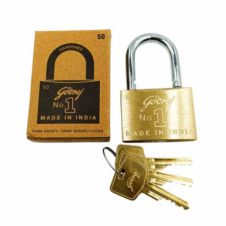 Gold lock with packaging and keys on a white background