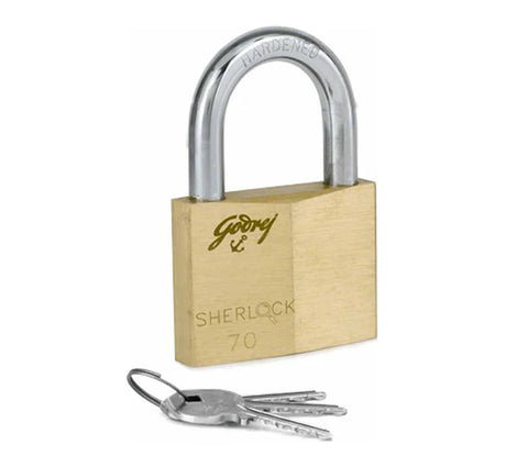 Brass padlock with key on a white background