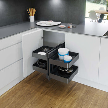 Kitchen corner with a pull-out storage shelf containing bowls and containers.
