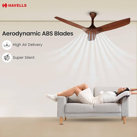 Ceiling fan with Aerodynamic ABS Blades in a room with a woman relaxing on a couch.
