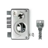 Metal door lock mechanism with a key on a white background
