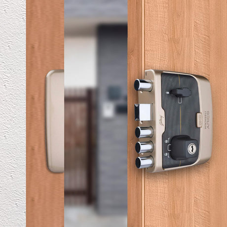 Close-up of a modern door lock mechanism on a wooden door.