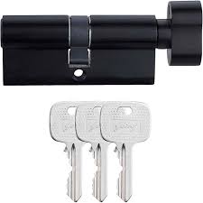 Black cylindrical lock with three keys on a white background