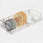 Metal dish rack with plates and bowls on a white background